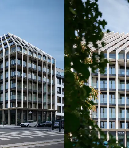Administrativní a rezidenční budova Victoria Palace v Praze s moderní prosklenou fasádou.